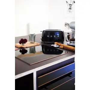 smeg-50s-style-toaster-tsf02bleu-black-46295-wlononwcrjfg3.webp